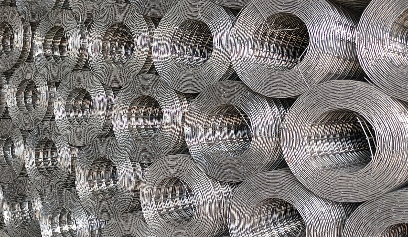 Galvanized welded wire mesh rolls stacked in the warehouse